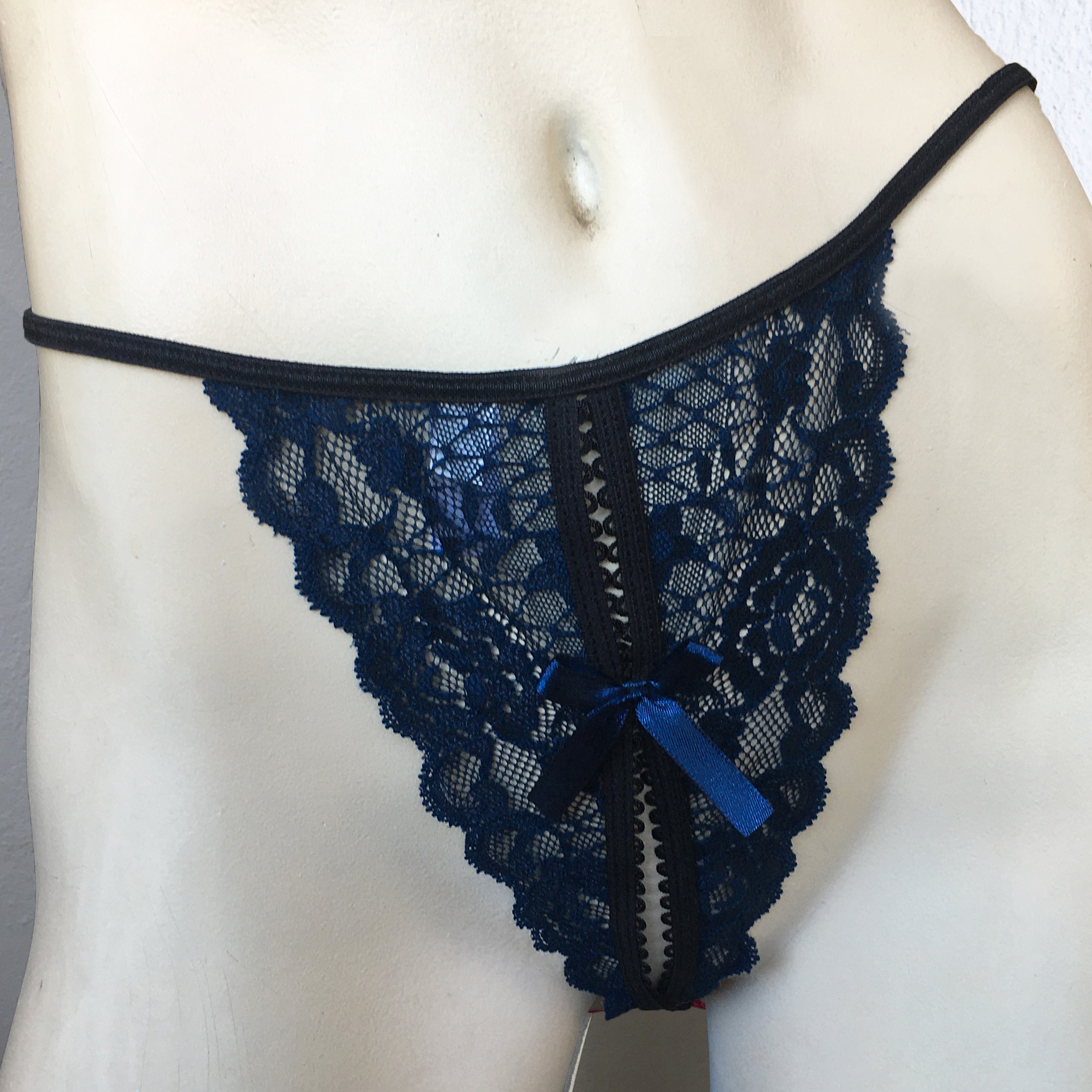 https://www.lingerieletters.co.za/wp-content/uploads/2024/01/NAVY-LACE-CROTCHLESS-T-STRING-FRONT2.jpg